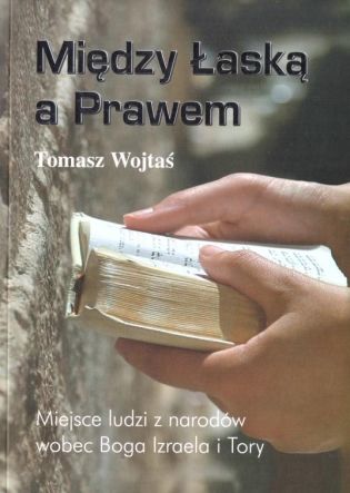 Między łaską a Prawem - Tomasz Wojtaś